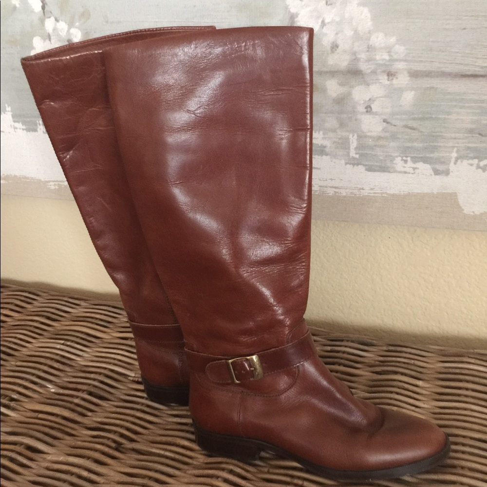 Etienne Aigner gently worn leather slip on boots.